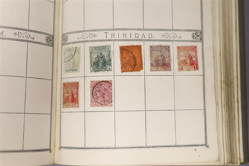 A Stanley Gibbons red stamp album and two others, each mounted with an accumulation of all world postage stamps